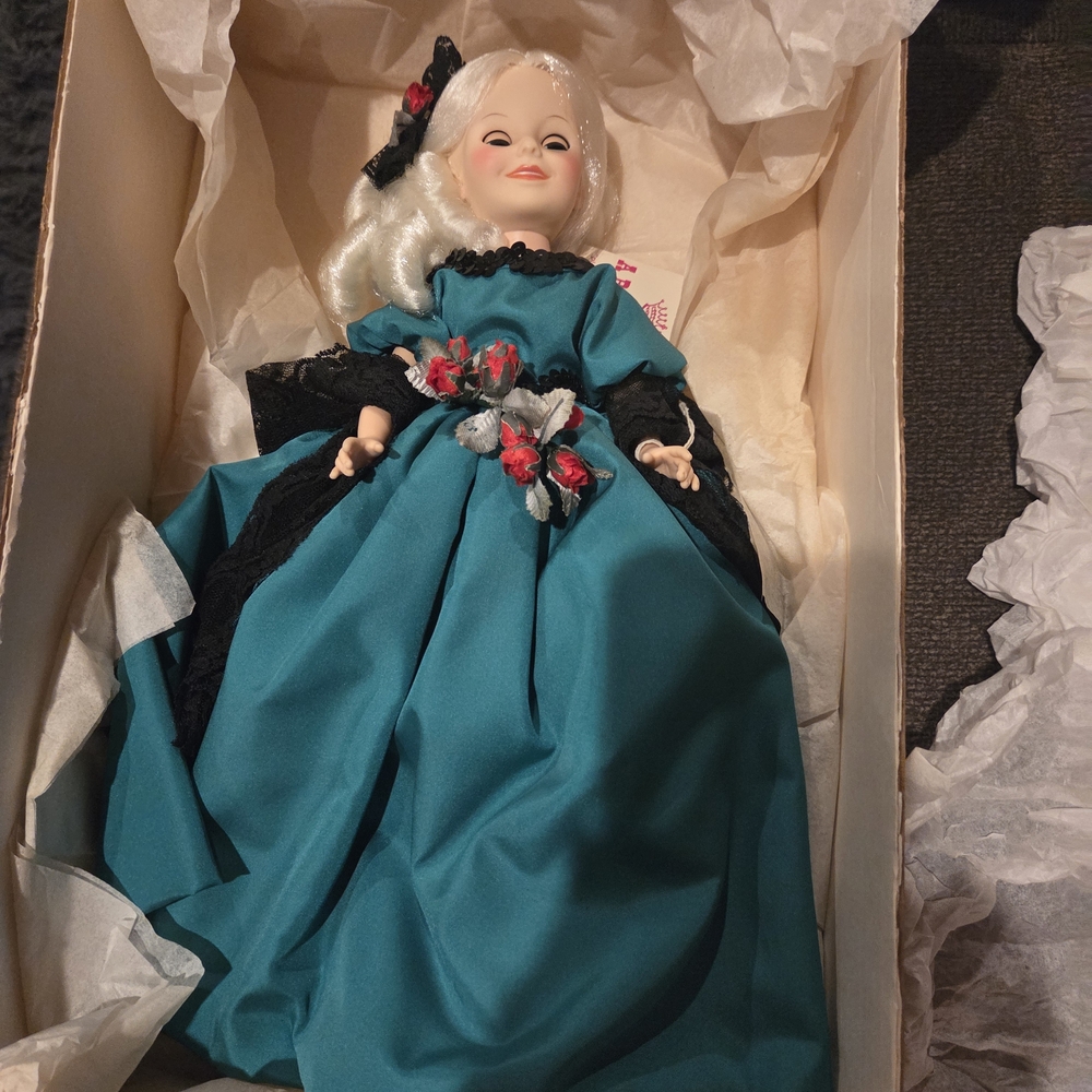 Elegant Teal Doll with Black Accents